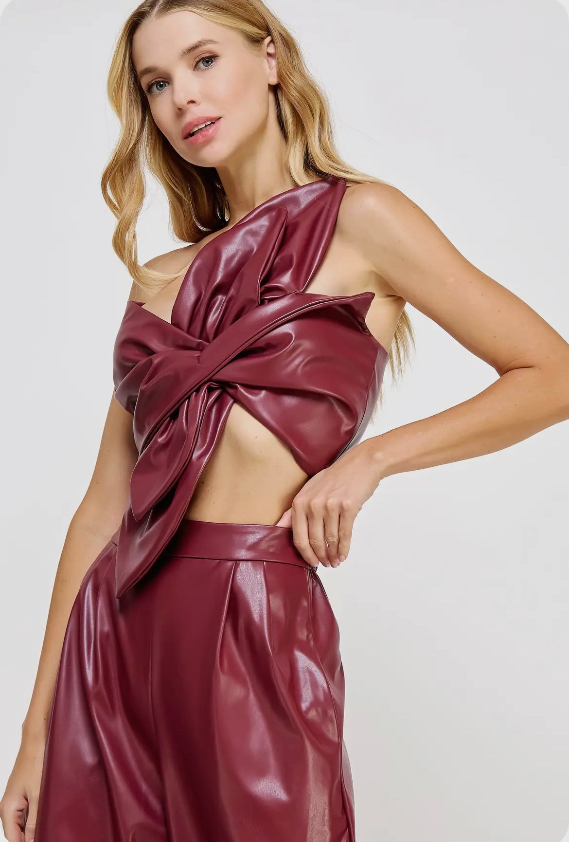 One-Shoulder Knotted Twist Faux
Leather Crop Top